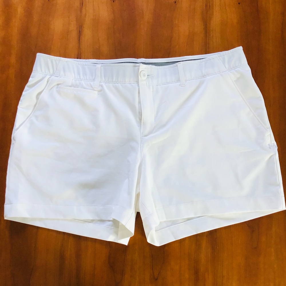 White Under Armour women’s golf shorts, size 14